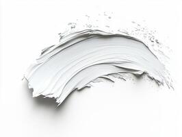 Soft white paint stroke on a clean canvas in natural light photo