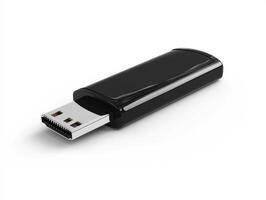 A black USB flash drive is displayed on a white surface photo