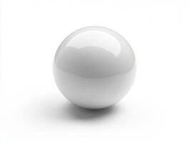 Glossy white sphere resting on a smooth white surface photo