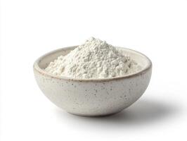 Flour in a decorative bowl on a white background photo