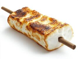 Perfectly toasted marshmallow on a stick ready for smores photo
