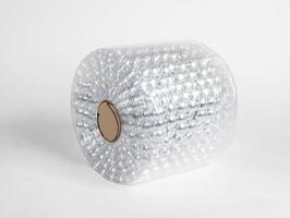 Roll of bubble wrap ready for packaging and shipping items photo