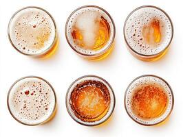 Craft beers arranged aesthetically in six glasses on a white surface photo