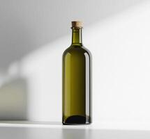 Elegant green glass bottle with cork on a minimalistic background photo