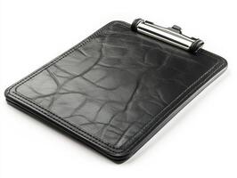 Clipboard with leather texture on a plain background photo