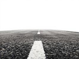 Open road stretching into the horizon on a foggy day photo