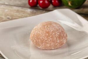 A plate with a ball of dough on it photo