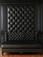 Elegant black tufted leather couch with matching wall paneling photo