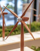 Detailed Copper Wind Turbine Model on Green Background photo