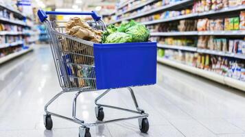 Fresh Produce in Shopping Cart at Grocery Store Aisle Surrounded by Varieties of Food Products photo