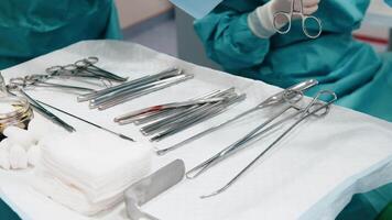 Close-up of medical instruments placed on the operating table. Concept of high-tech equipment ready for a complex surgical procedure. Perfect for medical projects video
