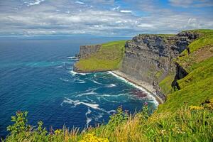 Breathtaking view of the Cliffs of Moher overlooking the Atlantic Ocean in Ireland 11 photo