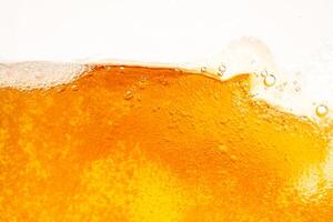 Close up bright orange Oil or beer splash texture and nature waves, Beautiful waves curve and little bubbles smooth for graphic design and background, Oil Bubbles, Soft beer bubbles, Select photo