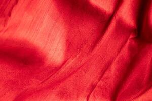 Abstract of shiny red silk White wrinkled fabric background texture and Texture with copy space ,Creased or wrinkled white fabric photo