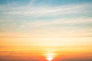 Beautiful , luxury soft gradient orange gold clouds and sunlight on the blue sky perfect for the background, take in evening,Twilight, Large size, high definition landscape pho photo