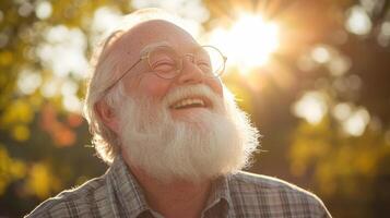 Elderly man with beard smiling in sunlit outdoor setting capturing joyful senior life photo
