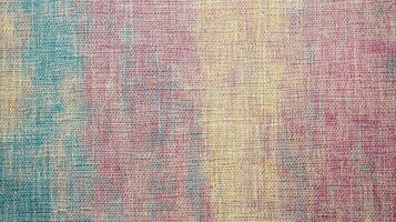 Textured fabric pattern with multicolor weave in pink, yellow and blue photo
