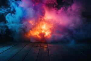 Vivid colorful smoke billowing on dark wooden floor with fiery glow photo