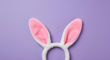 Happy Easter Rabbit Ears on a Light purple Background. A pastel Easter composition featuring bunny ears as a symbol of spring, renewal, and joy, great for festive designs and creative content photo
