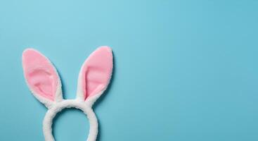 charming Easter holiday background featuring bunny ears in a top-view flat lay photo