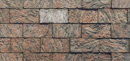 A close up of a brick roof with a square pattern photo