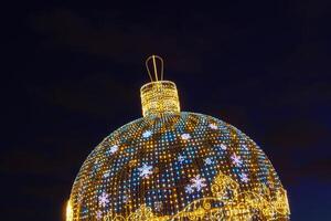 A large christmas tree with lights on it photo