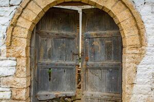 Old wooden gate in Berat Albania photo