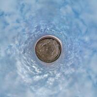 A circular view of a sky with clouds photo