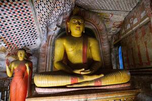 Dambulla, Sri Lanka 07 january 2025 Scenic view of the Dambulla Cave Temple in Sri Lanka, a famous Buddhist pilgrimage site with ancient wall paintings, golden Buddha statues, and sacred shrines photo
