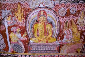 Dambulla, Sri Lanka 07 january 2025 Vibrant Buddhist murals inside the Dambulla Cave Temple, showcasing centuries-old religious artistry. photo