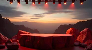 Stage with red lights and rocks in the background photo