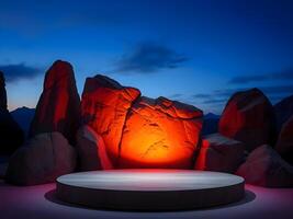 Stage with red light and rocks in the background photo