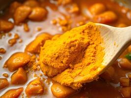 Tumeric in a pot photo