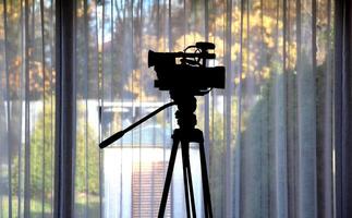 Camcorder On A Tripod With Wireless Microphone System photo