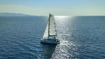 Sail Catamaran Floating At Calm Sea Aerial Photo