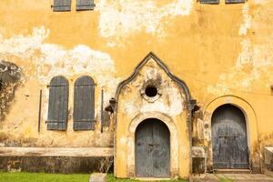 facade of colored prison wall in fort galle in sri lanka photo