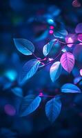 Leaves illuminated by neon light creating an ethereal and mystical visual experience photo