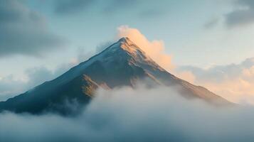 Misty mountain peak emerges through celestial skies, a sublime vision of nature's grandeur photo