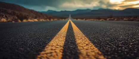 Sunset journey on an empty road desert landscape photography scenic view tranquil atmosphere photo