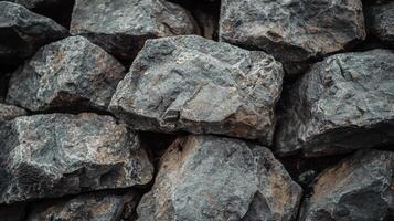 Raw natural stones piled together quarry site stock photo industrial environment close-up view texture concept