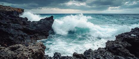 Dynamic ocean waves crash against rugged rocks coastal landscape nature photography dramatic seascape aerial view photo