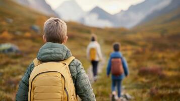 Family hiking adventure in nature capturing joy and exploration on scenic trail photo