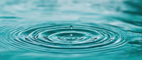 Water droplet rippling in closeup nature scene macro photography tranquil environment serene viewpoint photo