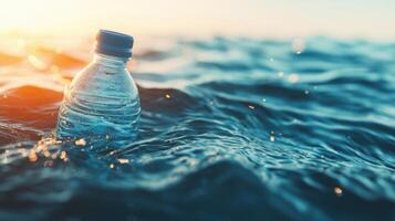 Floating plastic bottle in ocean waves environmental awareness nature sunset aerial view pollution concerns photo