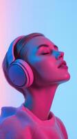 A woman wearing headphones in front of a neon background photo