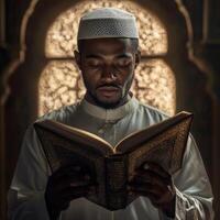 Muslim man reading quran in mosque photo