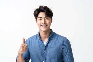 Portrait of young asian man showing thumbs up photo