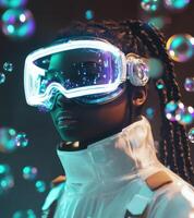 A woman wearing goggles and a white jacket photo