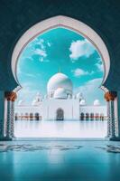 A beautiful white mosque with blue sky and white pillars photo
