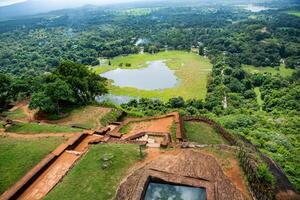 Aerial view of Sigiriya Rock Fortress in Sri Lanka, one of the country's most iconic historical landmarks. A must-visit destination for travelers interested in archaeology, history photo